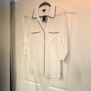 White blouse with black trim